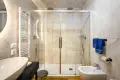 Modern bathroom with large chromotherapy shower